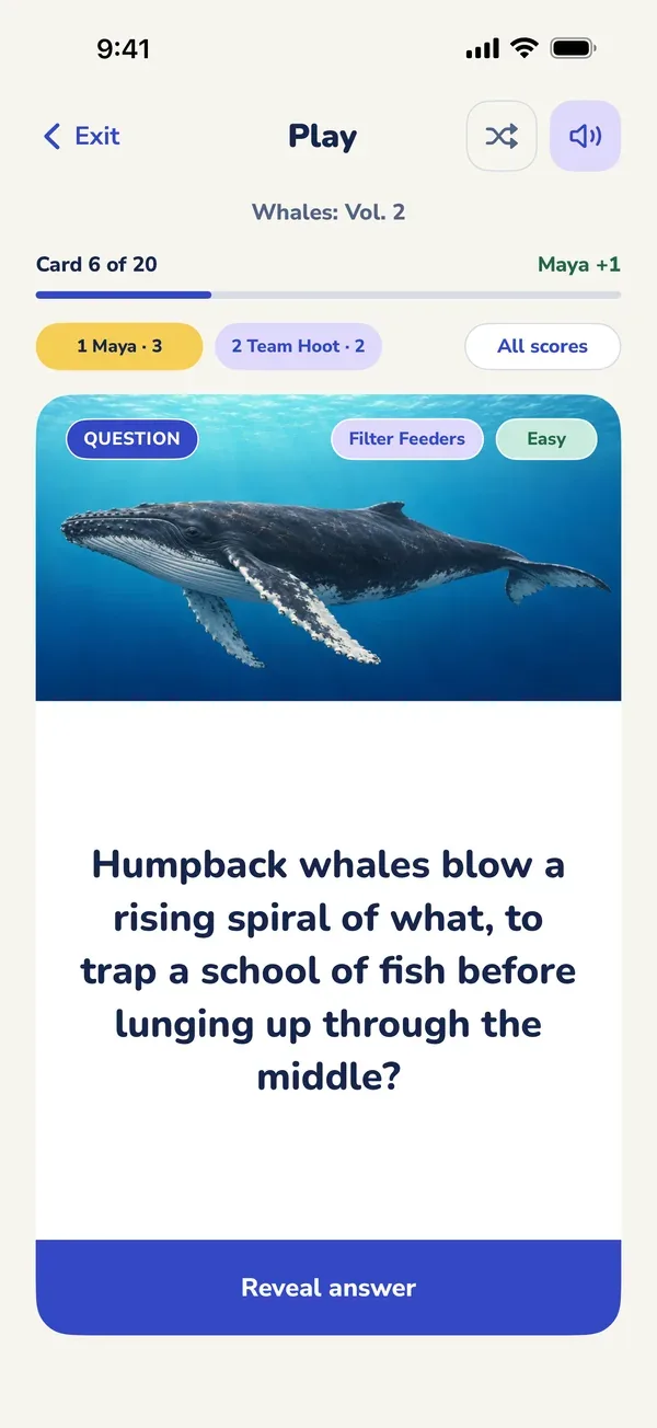 A question card in the Loud Owl app, under a picture of a humpback whale, with Reveal answer below.